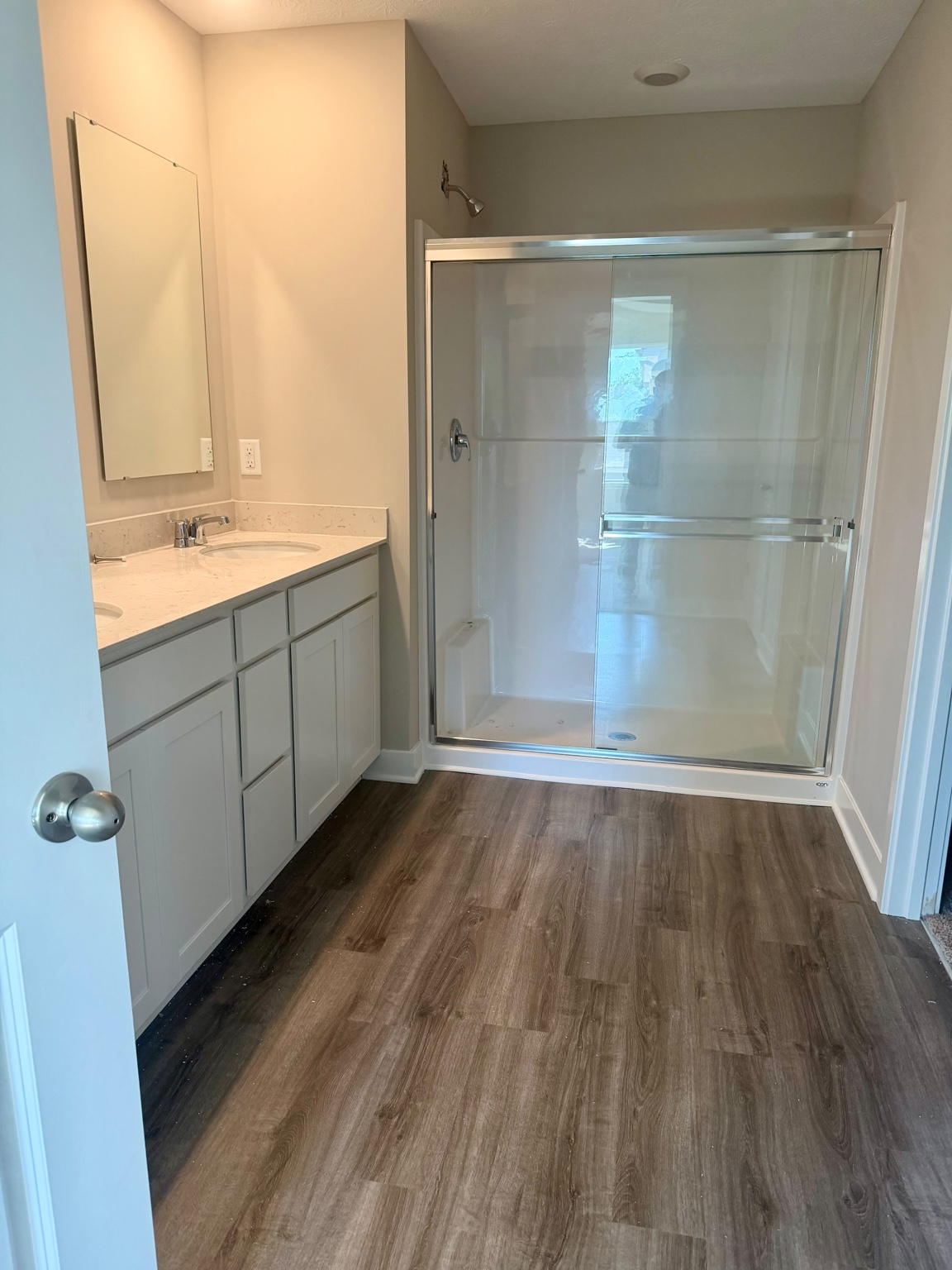 Bathroom with glass-enclosed shower