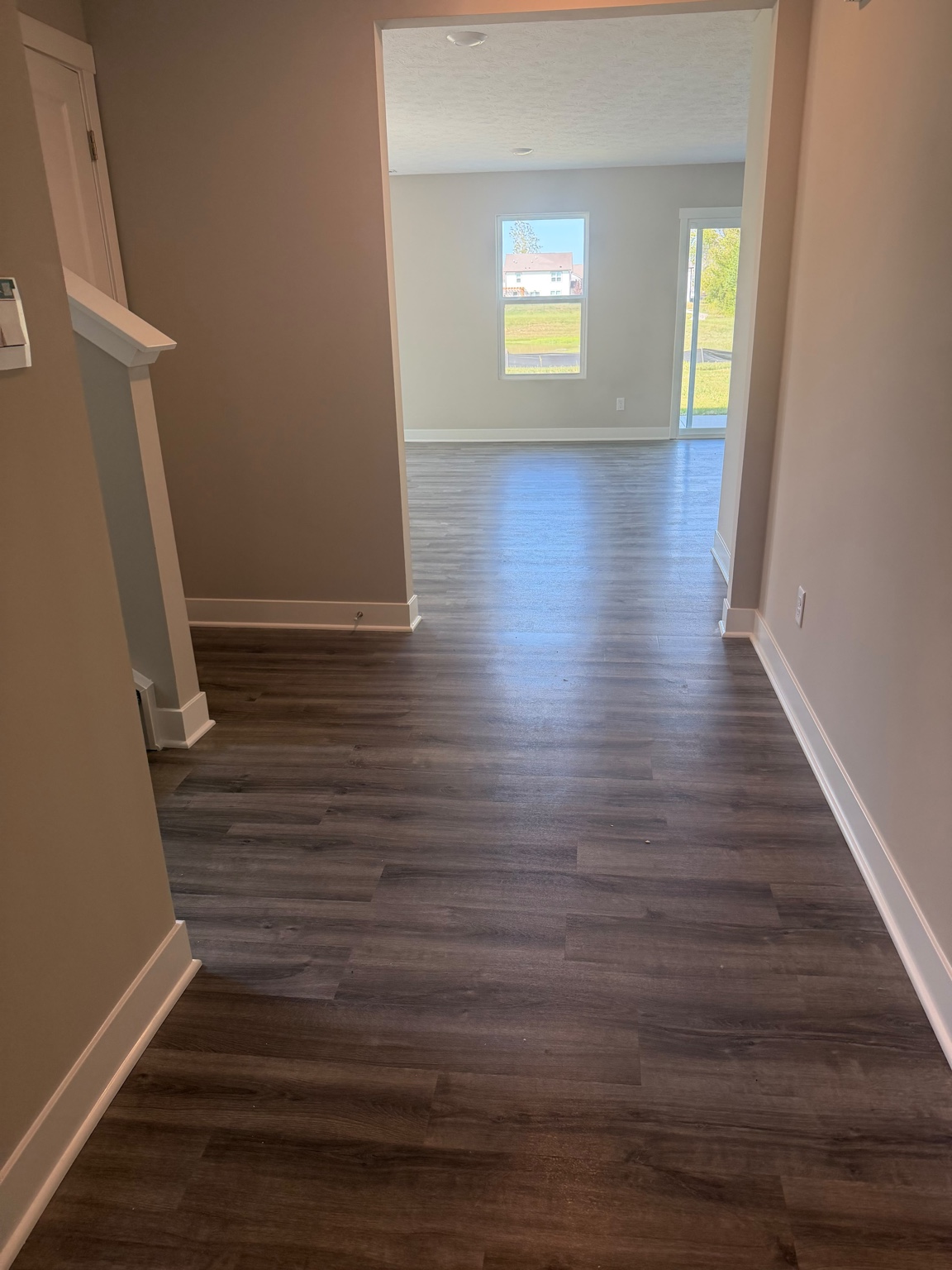 Main-level hallway and durable flooring