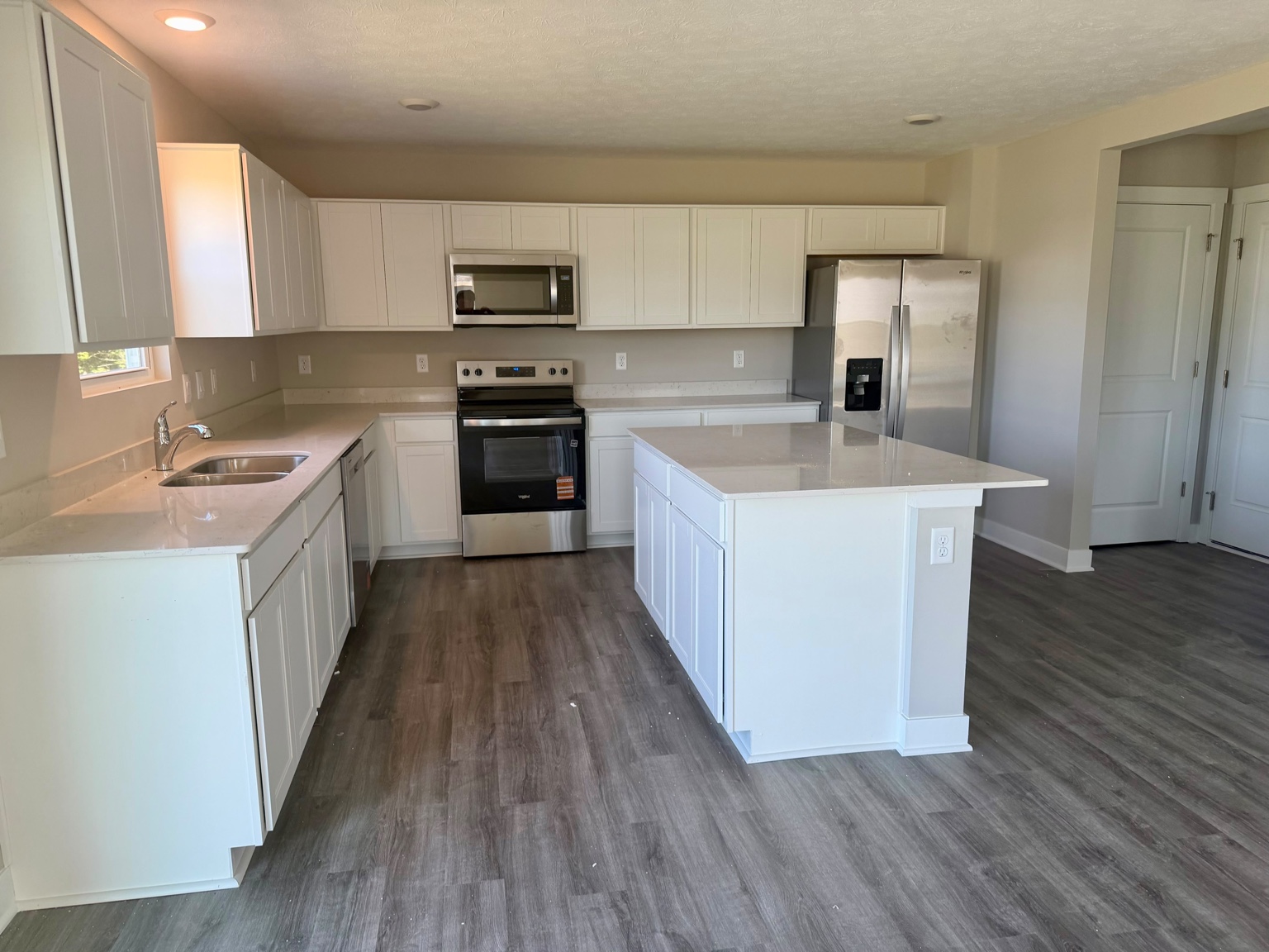 Second view of the kitchen and stainless-steel appliances
