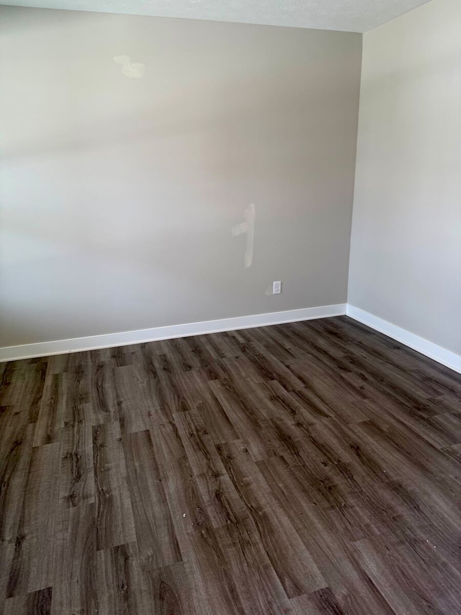 Additional room with durable flooring and neutral finishes